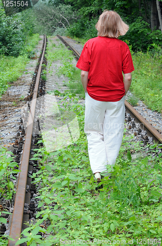 Image of Walking Away Along Abandoned Railroad Track