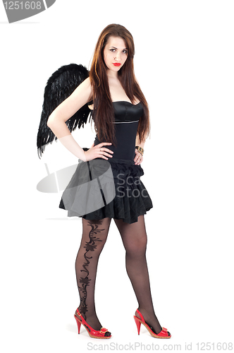 Image of Beautiful brunette woman with black wings