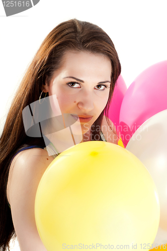 Image of Beautiful woman with multicolored air balloons