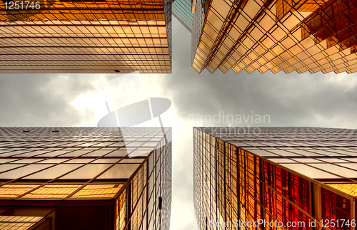 Image of Skyscrapers with clouds reflection 