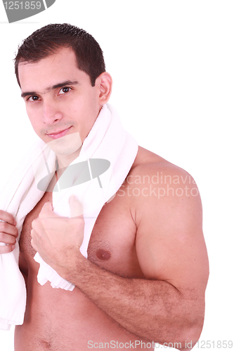 Image of Smart cute attractive guy toweling hair and body skin