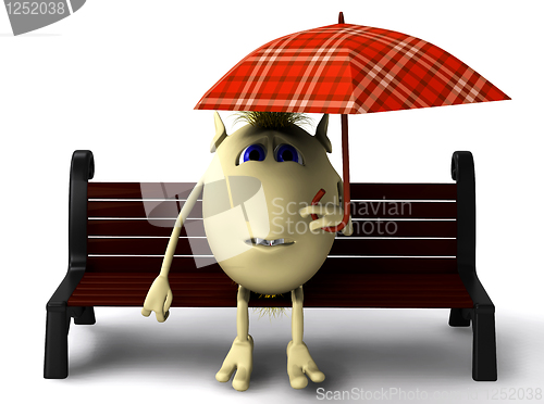 Image of Puppet hide itself under umbrella from rain