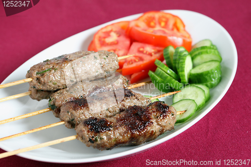 Image of Arab lamb kofta on a plate