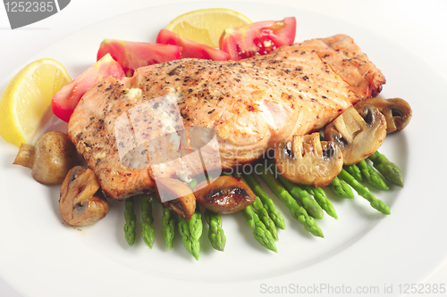 Image of Pan-seared salmon steak and veg