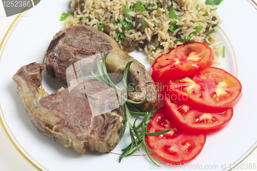 Image of Lamb chops and rice high angle