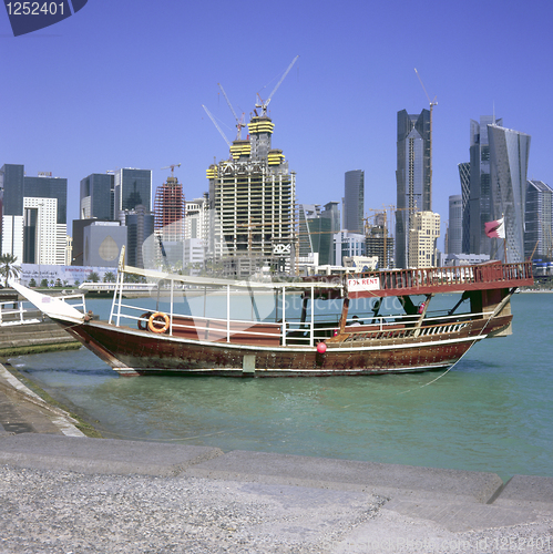 Image of Moored dhow and Doha skyline