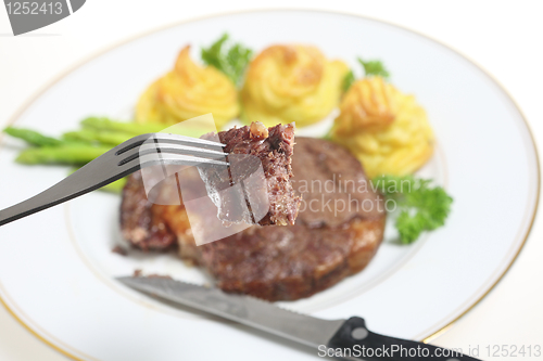 Image of Eating ribeye steak