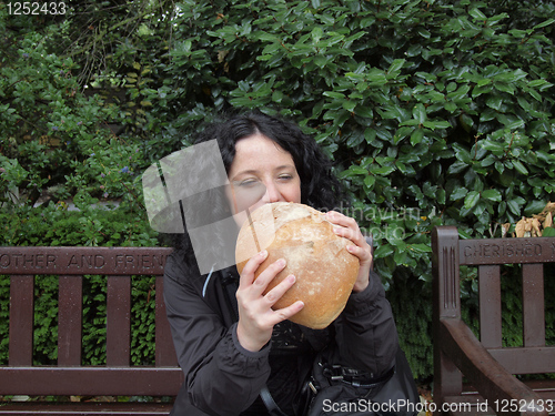 Image of Girl eating bread