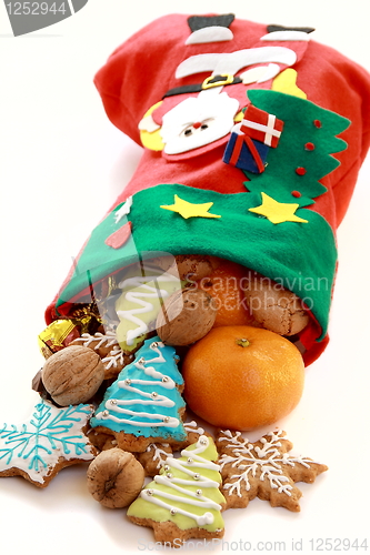 Image of Beautiful Christmas stockings with gifts.