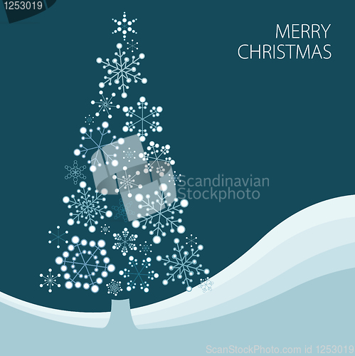 Image of Christmas tree made from simple snowflakes