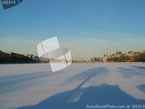 Image of frosen lake in the city