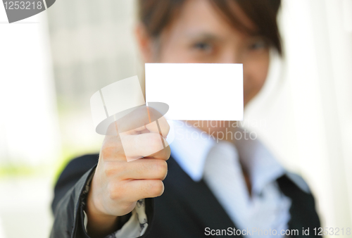 Image of Business woman with business card
