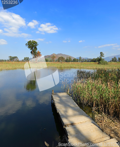 Image of lake landscape with wooden pier