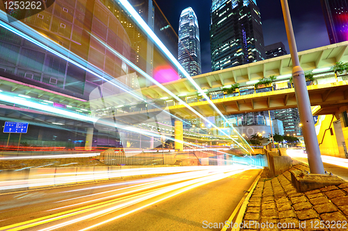 Image of modern city traffic at night