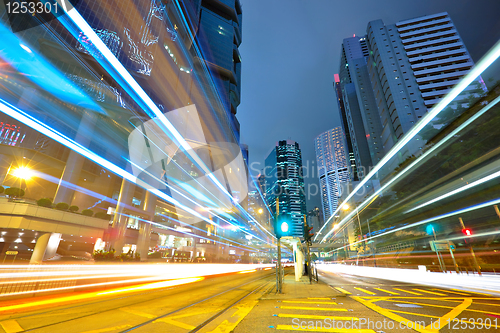 Image of traffic light stream and highrise bulidings