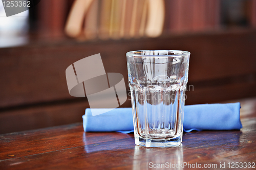 Image of glass on a table at restaurant