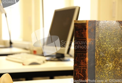 Image of books and computer