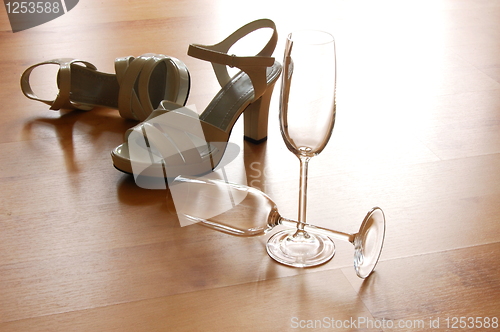 Image of sexy high heel and champagne glass