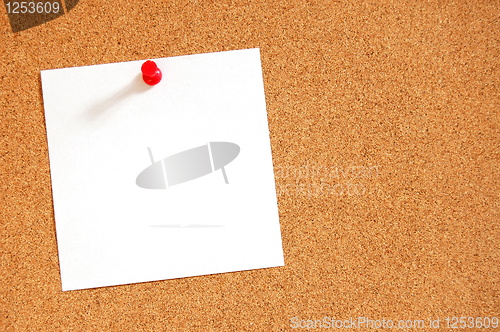 Image of empty sheet paper with push pin