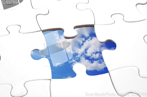 Image of puzzle and sky