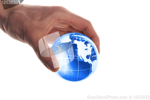 Image of globe in hand