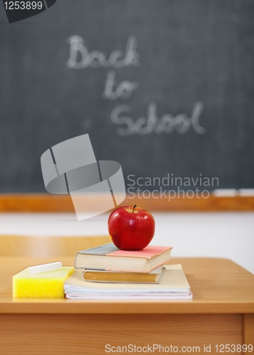 Image of Back to school on chalkboard and apple