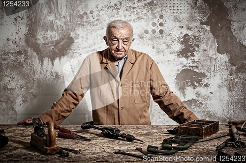 Image of old manual worker