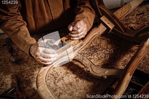 Image of craftman at work