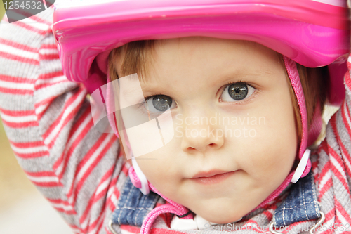 Image of Little girl with helmet