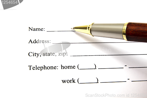 Image of Pen isolated on a blank signature paper 