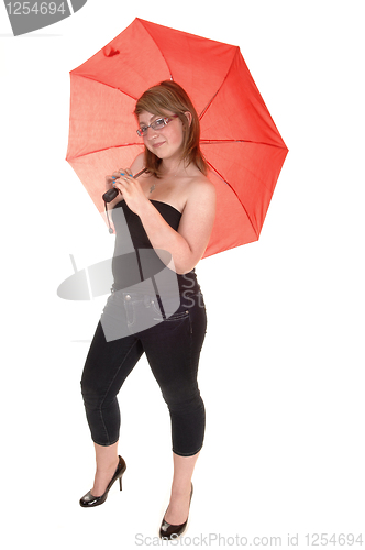 Image of Umbrella holding teenager.