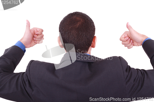 Image of A businessman gives a thumbs up (back)