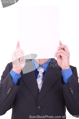 Image of A businessman with a blank paper in his face isolated on white 