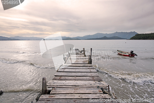 Image of old jetty walkway pier the the lake 