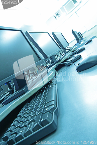 Image of workplace room with computers