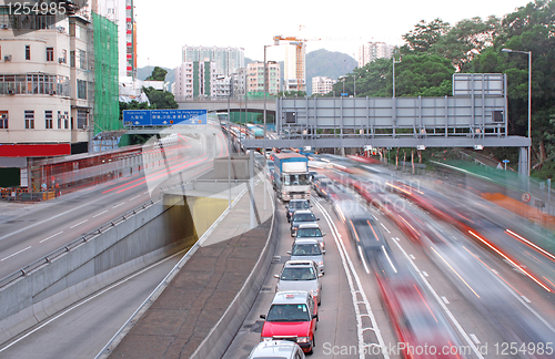 Image of Heavy traffic through the modern city 