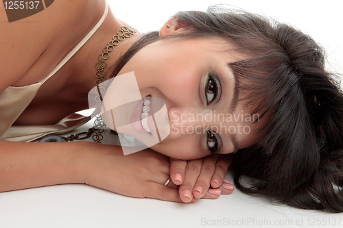 Image of Attractive smiling woman relaxes