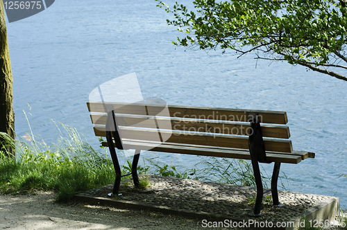 Image of Empty bench on the lake