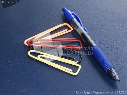 Image of colored paper clips and pen 2