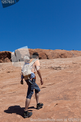 Image of father and son hiking