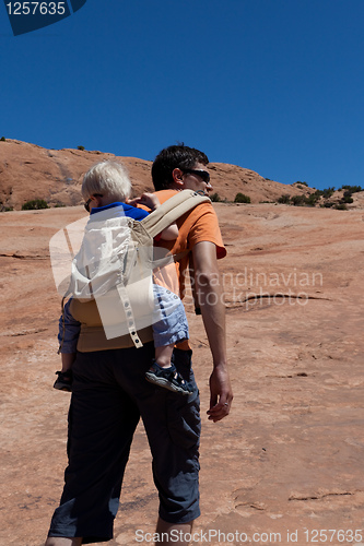 Image of father and son hiking