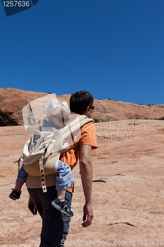 Image of father and son hiking