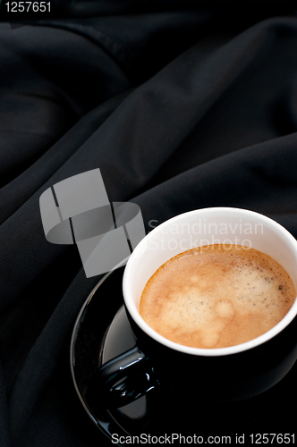 Image of Cup of Coffee on Black Drapery