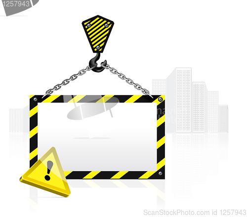 Image of crane hook with blank poster