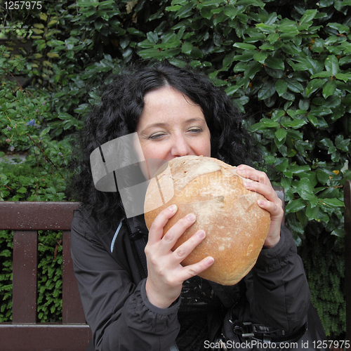 Image of Girl eating bread