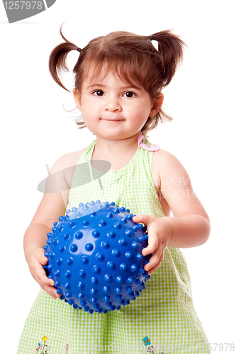 Image of Happy toddler girl with ball