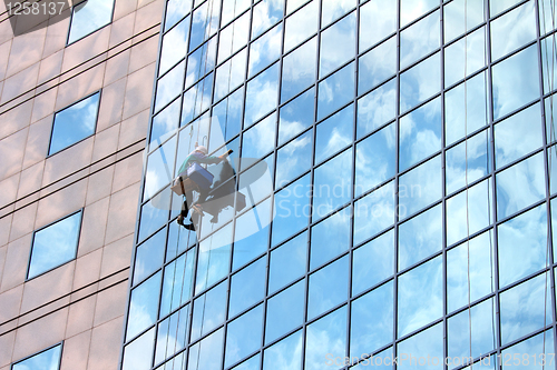 Image of window cleaner at work