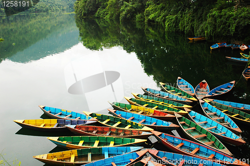 Image of Colorful tour boats at lakeside