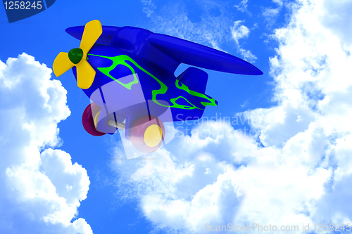 Image of Plane with yellow propeller fly in sky
