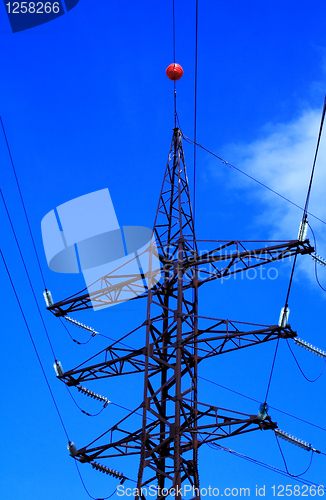 Image of  Foto of voltage tower at summer day